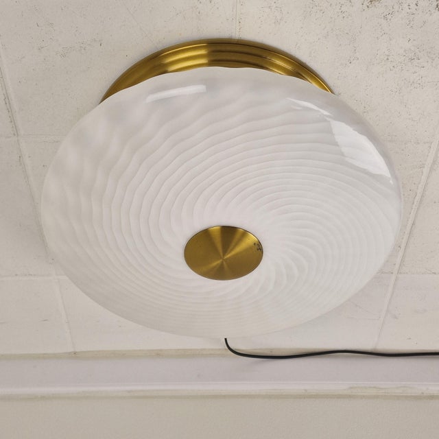 An exceptional, large-scale 1970s Italian flush mount ceiling light, boasting an impressive diameter of 47 cm. This...