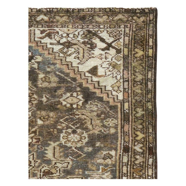 A vintage Persian Malayer throw rug handmade during the mid-20th century. Measures: 2' 7" x 3' 10"