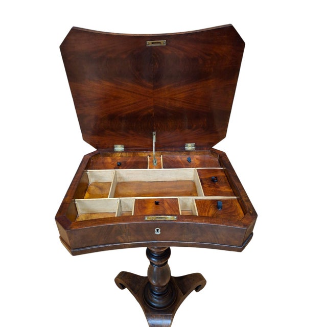 Charming 19th century mahogany sewing table with multiple interior compartments (a couple of the lids missing), turned...