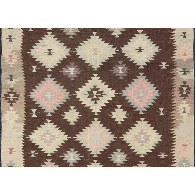 Turkish Kilim vintage in dark brown background and cream with graphic tribal design, Keivan Woven Arts rug/TU-NED-1009,...