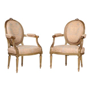 Mid 19th Century Pair of Louis XVI Style Carved Giltwood Fauteuils For Sale