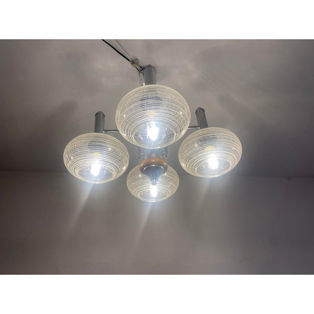 Mid-Century Modern Vintage Space Age Sputnik Chandelier in Chrome-Plated Metal, Wooden Accents and Clear Ribbed Glass Shades by Emi Poljčane, Yugoslav, 1970s For Sale - Image 3 of 18