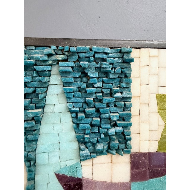 Striking signed mid-century mosaic wall panel by June E. Johnson, dated 1962 on the reverse. This rectangular composition...