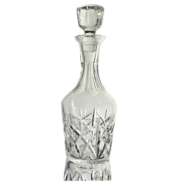Elegant Atlantis Crystal decanter with fitted stopper, crafted in Portugal from fine cut glass with 24% lead content....