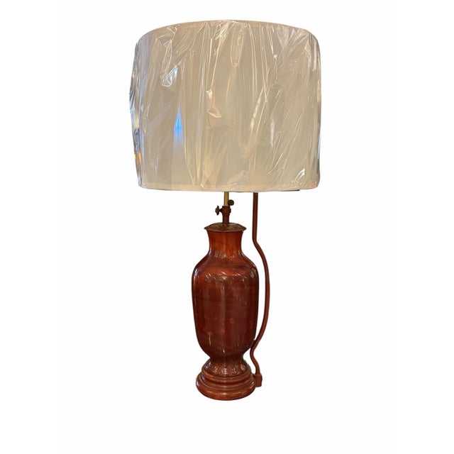 This striking pair of mid-century table lamps, attributed to the renowned Marbro Lamp Company, features a rich, mottled...