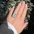 Vintage Cocktail Ring in 18 carat white gold (750 thousandths). It is adorned with a beautiful colored aquamarine of...