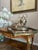 Elegant inlaid serving table with a separate removable glass tray resting on top, finished with a pierced brass gallery....