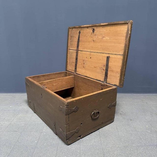 Antique pine chest, brown-green painted, from Sweden, circa 1800. This chest features beautiful old ironwork, including...