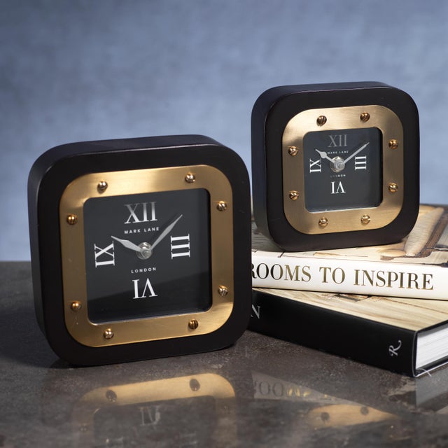 Versatile and intricate, the Mark Lane Table Clock is an eye-catching addition to your home decor. Made of iron, its...