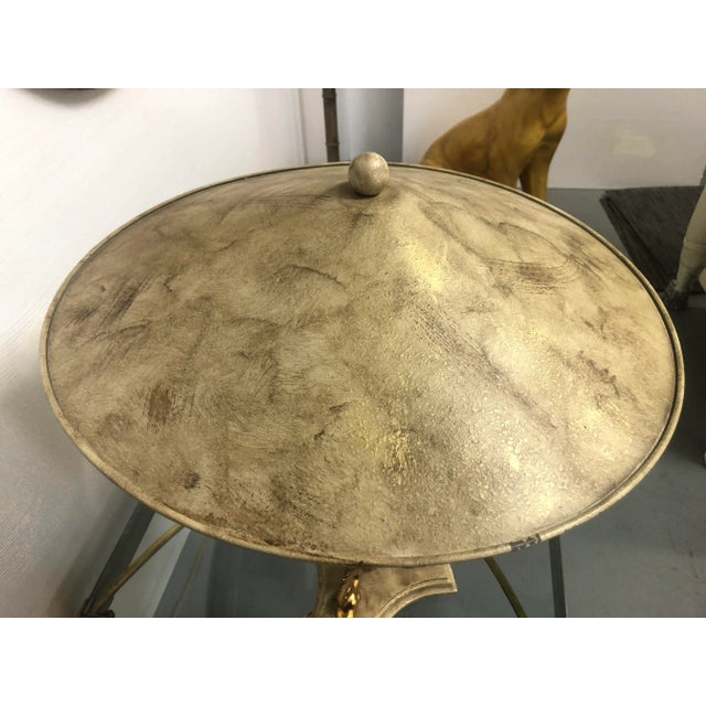 Elegant modernist lamp by premier manufacturer Bauer Lamp Company. Three solid brass koi fish dragons circling the base of...