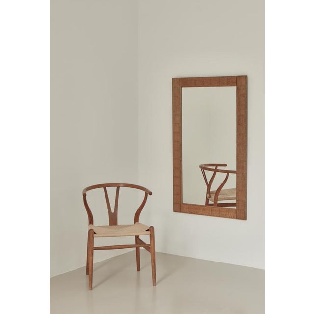 Large brutalist style wall mirror in solid oakwood made in Denmark in the 1960s. In the style of Henry Kjaernulff.