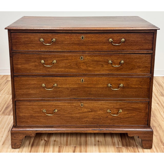 Handsome antique English George III mahogany chest of drawers. Rich coloring with a light patina. Solid bracket feet....
