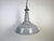 Industrial grey enamel factory pendant light made by benjamin in united kingdom during the 1960s. White enamel inside the...