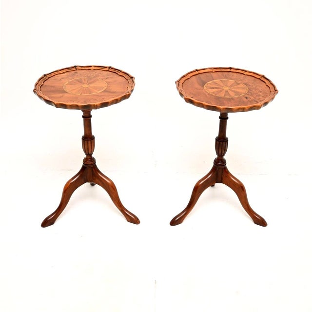 A smart and extremely well made pair of antique Georgian inlaid yew wood wine tables. They were made in England, they date...