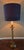 Antique brass finish open barley twist candlestick lamp with shade. The electric cord runs up through one of the twists....