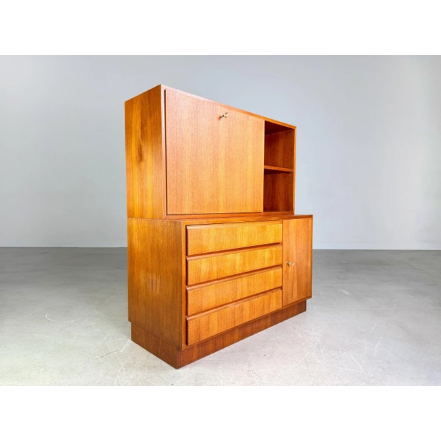 Beautiful chest of drawers/secretary with cabinet attachment from the 1960s from wk möbel for sale. The furniture consists...