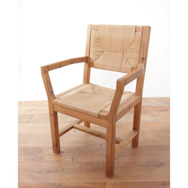 A set of four Danish dining chairs designed by Tage Poulsen and produced by Gramrode Møbelfabrik in Denmark, circa 1974....