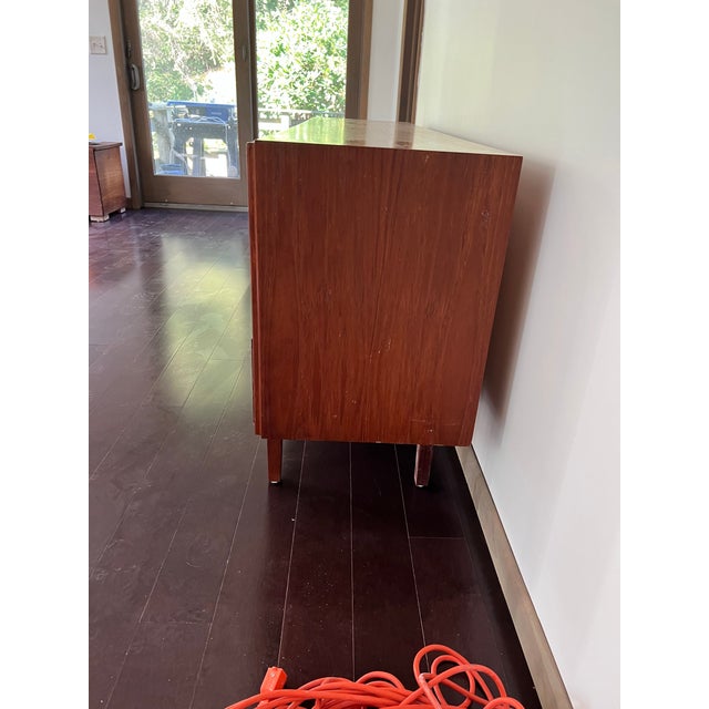 Gorgeous Mod Century’ Modern dresser. We believe it was made in the Netherlands and is made out of teakwood. It is solidly...