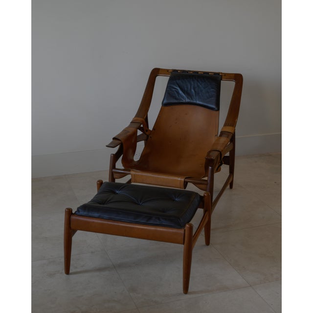 Liceu de Artes e Oficios Cognac Leather Lounge Chair and Ottoman, Brazil 1960s Founded in 1873, Liceu de Artes e Ofícios...