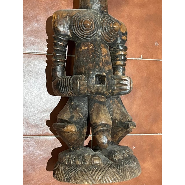 Carved wood measuring 78 x 24 cm. This piece is attributed to the mentioned designer/maker. It has no attribution mark and...