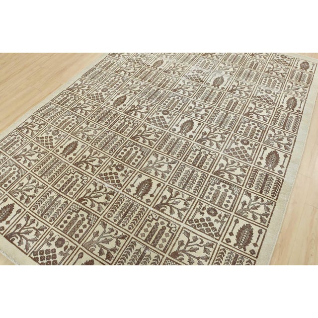 An authentic vintage traditional Bakhtiari rug hand-knotted with an all-wool pile on a cotton foundation. This oriental...