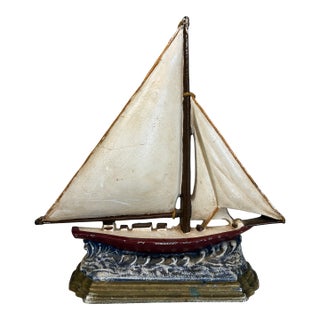 Late 20th Century Cast Iron Sailboat Doorstop on Wave Base For Sale