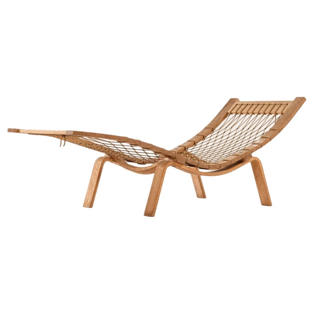 Lounge Chair in Oak and Sheepskin attributed to Hans Wegner, 1960s For Sale