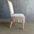 Introducing the elegant Reese white oak dining chairs, featuring custom slipcovers crafted from luxurious Belgian linen....