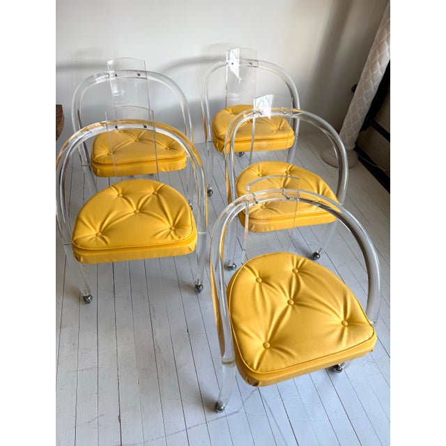 Vintage 1970’s postmodern Charles Hollis Jones style lucite rolling chairs. The chairs do have some crazing marks when...
