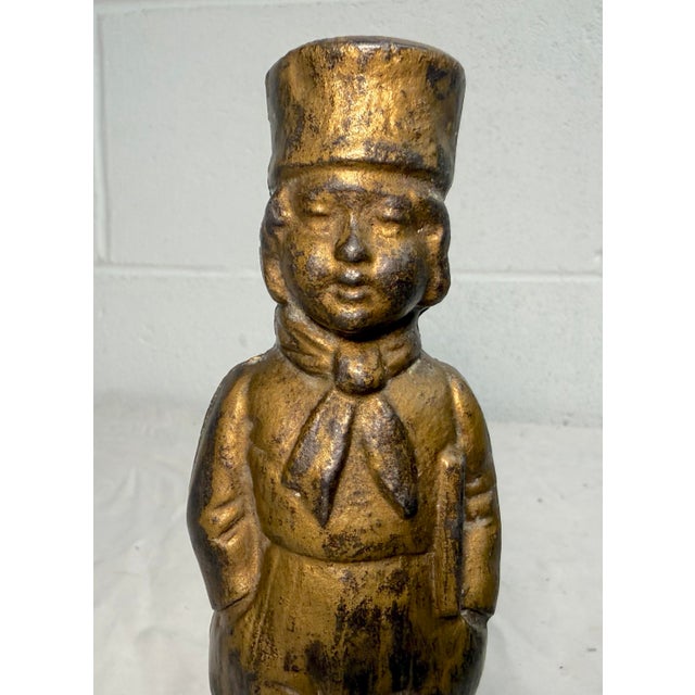 This rare antique late 19th century cast Iron boy still bank by A.C. Williams is a unique and collectible piece with an...