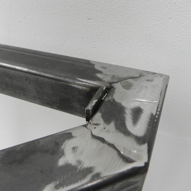 The white display case originally has hung against the wall in a butcher's shop. We have made a separate frame for it so...