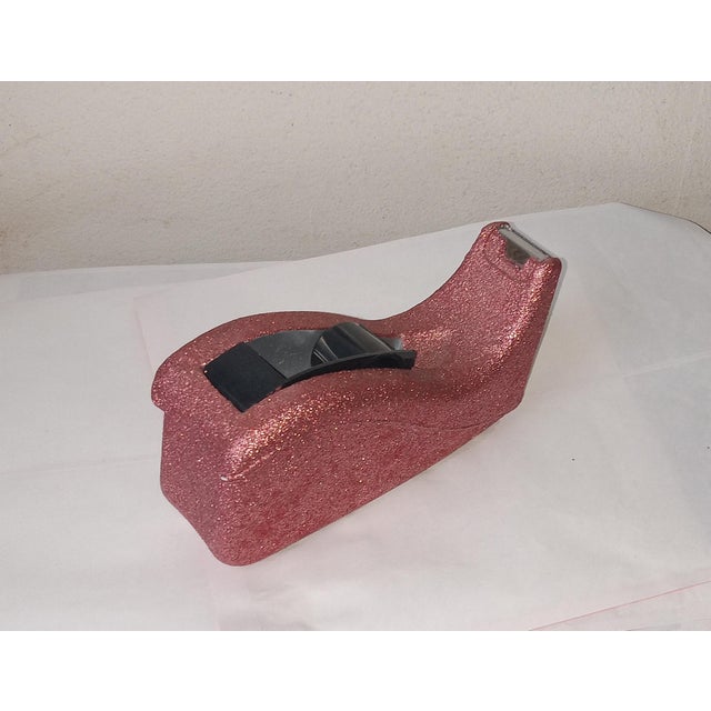 Most tape dispensers are meant to be hidden in a drawer, but this piece was built to be the main event. Sculpted with a...