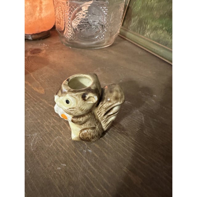 Up for consideration is a beautiful small ceramic squirrel candleholder. This would look lovely in your home and it is a...