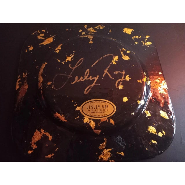 This is a Signed Lesley Roy 8" Gold Aventurine Floral Plate. Procured at auction BOX 8