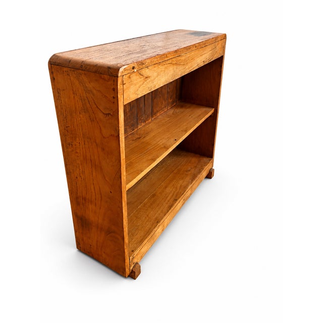 Antique wooden shelving unit with a wonderfully simple, utilitarian design and a warm aged patina. The rounded corners,...