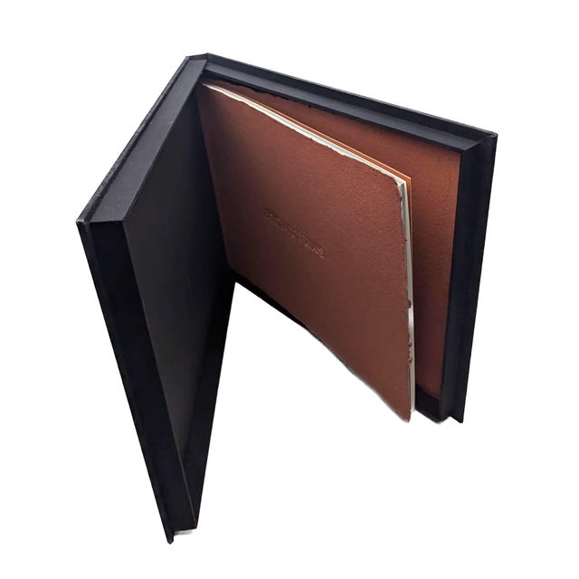 Hugo Zapata's ESCRITURAS artist's book is an edition of the ARTE DOS GRÁFICO Workshop in Bogotá, Colombia. This is No. 65...