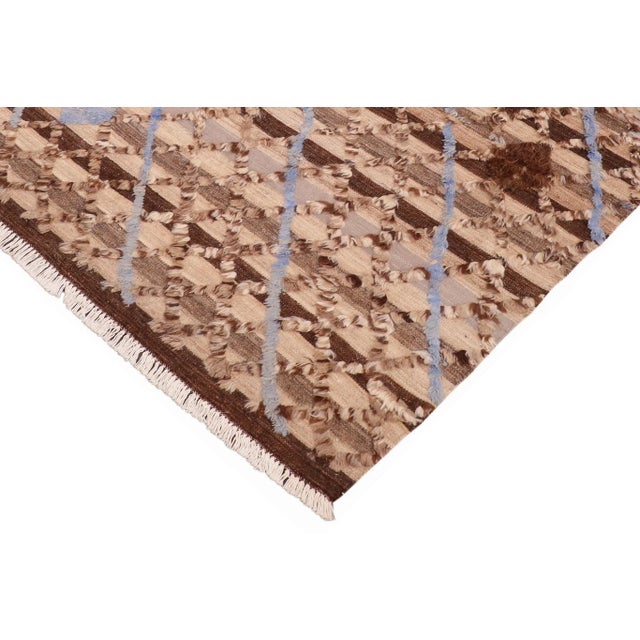 Make a statement in your home with this meticulously hand-knotted high-low pile Moroccan wool rug. An intricate design...