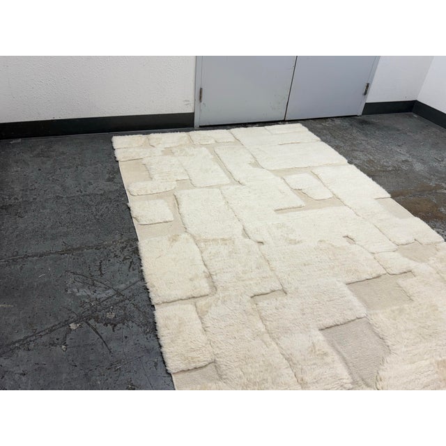 Design Plus Gallery presents the 6ft × 9ft 1in Ilyas Wool Rug from Restoration Hardware. Woven by skilled artisans, this...