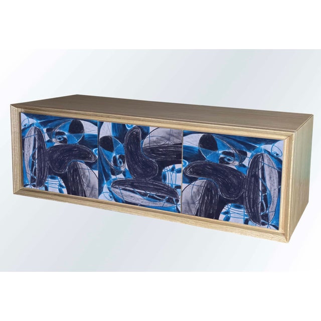 "Disegno Due" suspended sideboard, 2026, by Meccani Studio for Meccani Design. A beautiful suspended oak sideboard with...