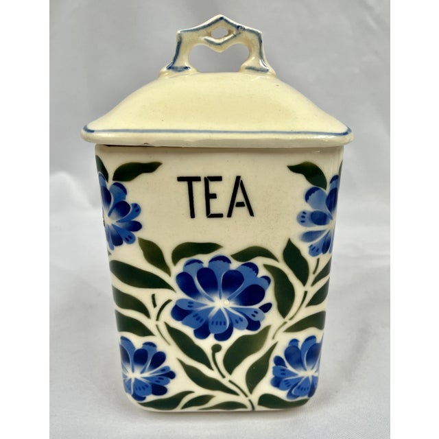 Made in "Cecho Slovakia". Beautiful hand painted floral canister set. Four large containers and three spices. All pieces...