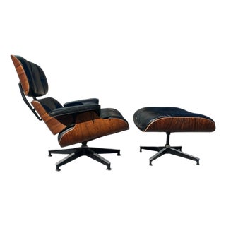 Herman Miller Eames Lounge Chair & Ottoman in Rosewood and Black Leather For Sale