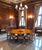 An exceptional English Regency Revival dining table, handcrafted in England during the mid-20th century and distinguished...