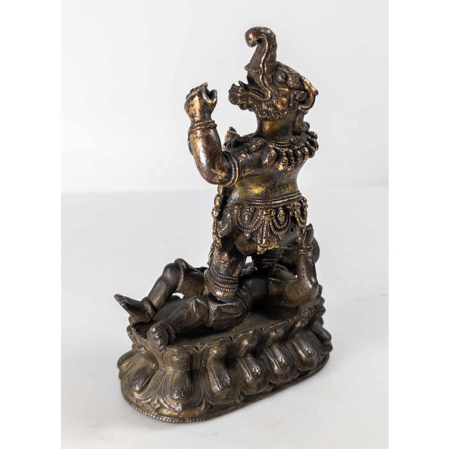 Bronze 17th or 18th Century Chinese Sino-Tibetan Gilt Bronze Buddhist Makala Faced Deity Figure For Sale - Image 8 of 18