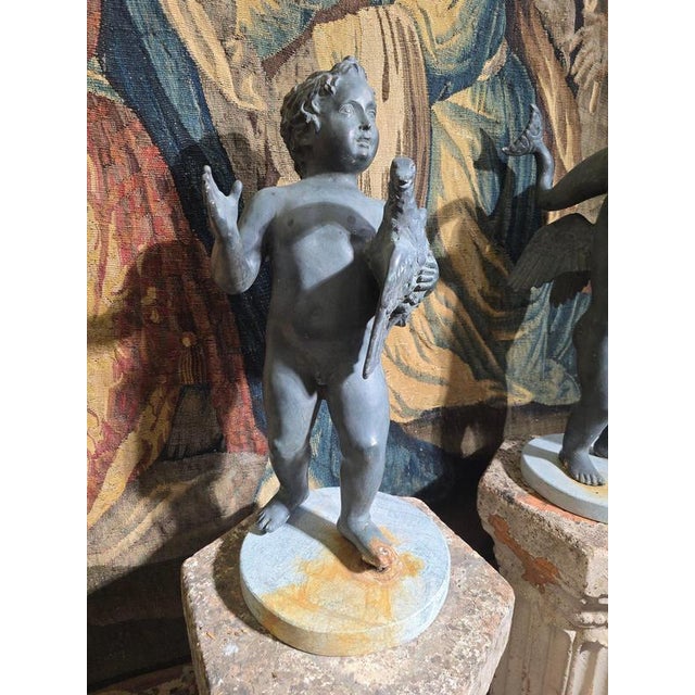 An exceptional and highly decorative pair of Italian Grand Tour bronze sculptures dating from the late 19th century,...