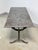 A late 19th century French cast iron bistro table with marble top from the L. Buchon Foundry in St. Etienne, France. It...