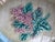 An old majolica trinket tray depicting a pink lilac. Made in England. It is aging nicely.