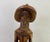 A vintage Mid-Century period Folk art sculpture of a man standing tall. The sculpture is finely carved of quality wood and...