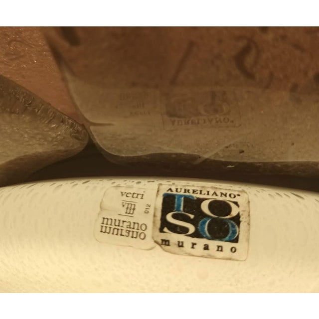 A refined vintage Italian Murano glass flush mount ceiling light by Aureliano Toso, dating to the 1960s. This elegant...