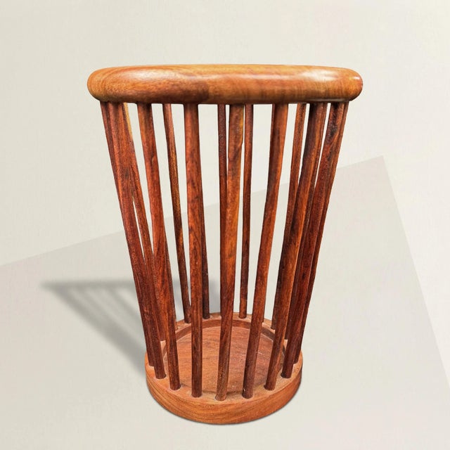 This mid-20th century Danish Modern wastepaper basket, meticulously constructed from rich mahogany, epitomizes stylish...