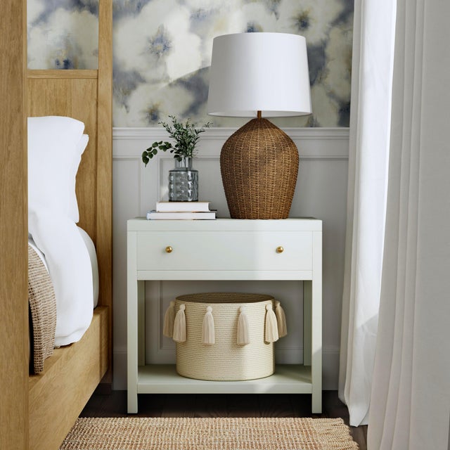 Enhance your bedroom or living space with the Butler Specialty Company Nora Wide Nightstand, a stylish blend of modern...